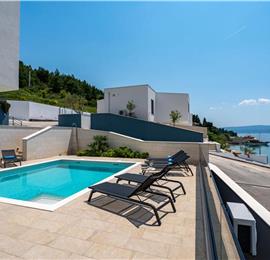 5 bedroom beachfront villa with heated pool near Omis, sleeps 9